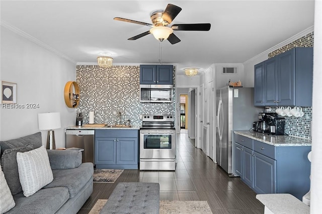 kitchen featuring backsplash, crown molding, stainless steel appliances, and blue cabinets