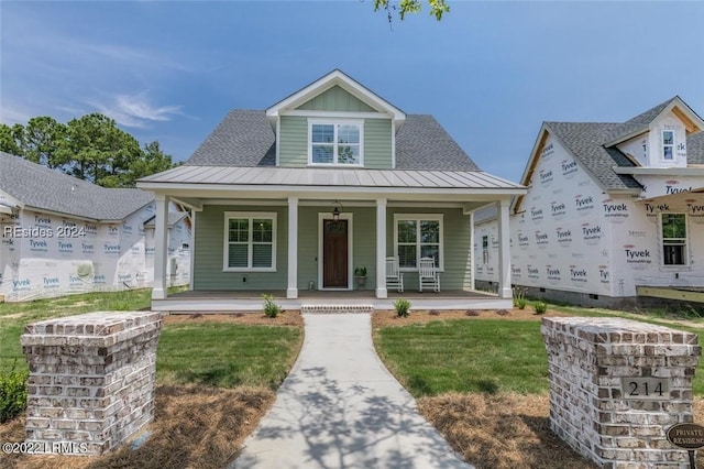 view of front of home featuring covered porch