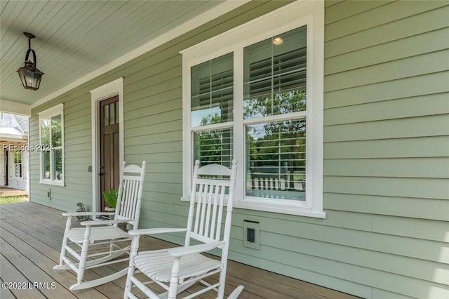 wooden terrace with covered porch