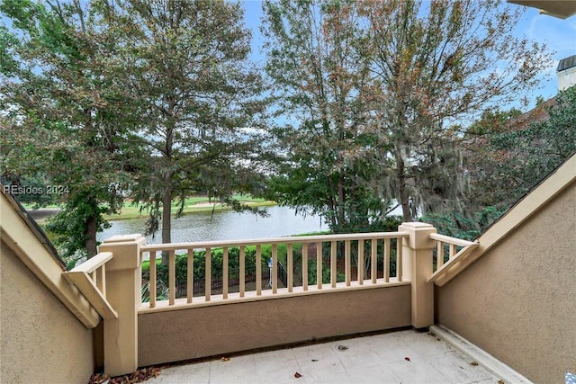 balcony featuring a water view