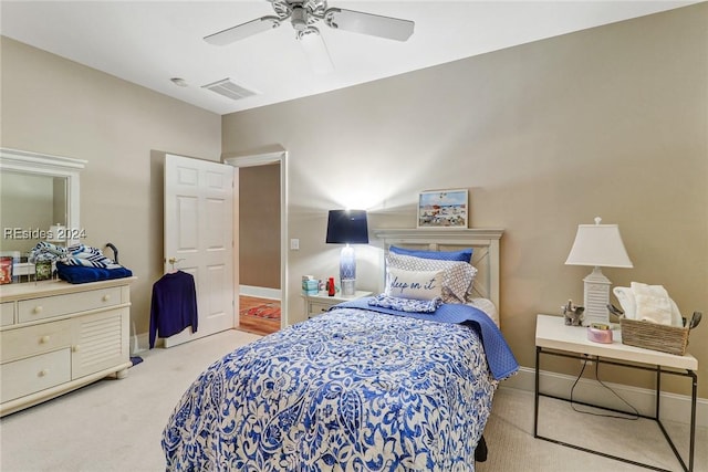 carpeted bedroom featuring ceiling fan