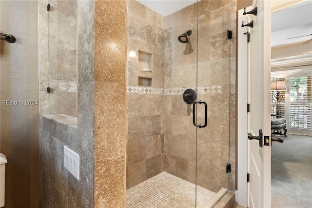 bathroom featuring an enclosed shower