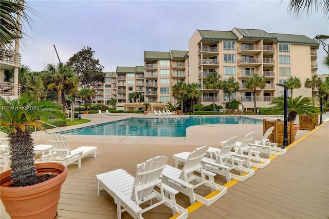 view of swimming pool featuring a patio