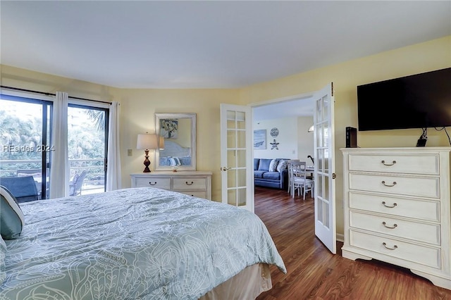 bedroom featuring dark hardwood / wood-style flooring, access to outside, and french doors