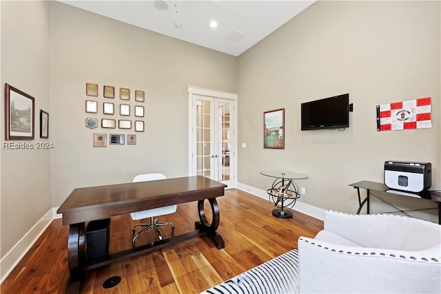 office area featuring french doors and hardwood / wood-style flooring