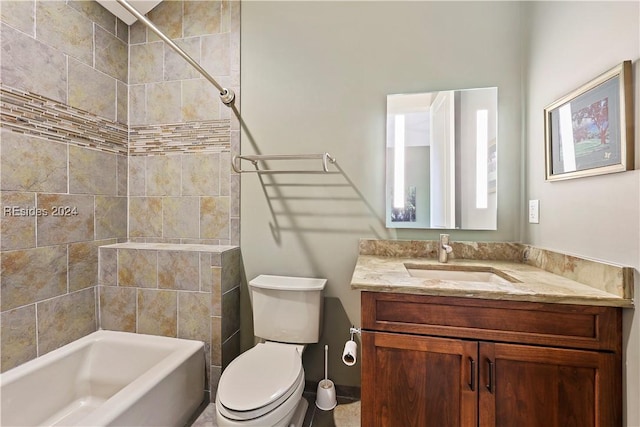 full bathroom featuring vanity, toilet, and tiled shower / bath combo