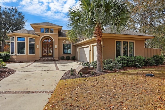 view of front of house with a garage