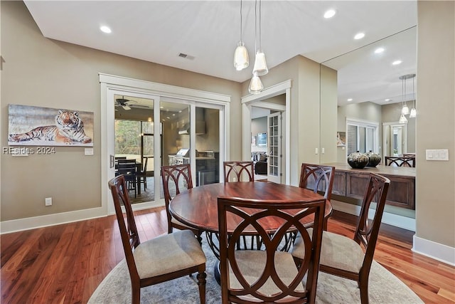 dining space featuring light hardwood / wood-style flooring