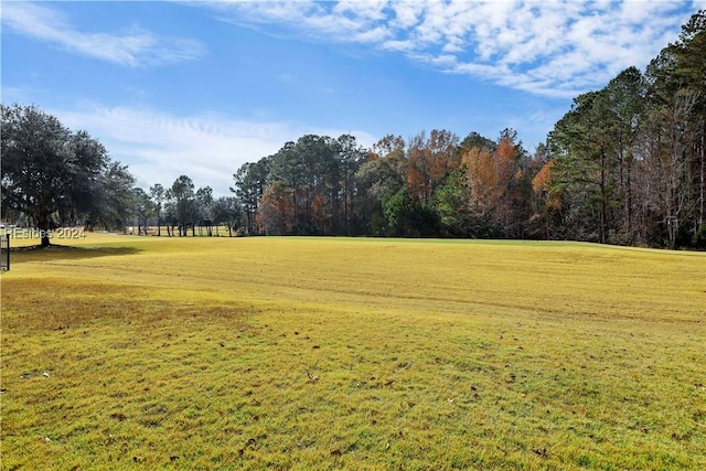 surrounding community with a yard