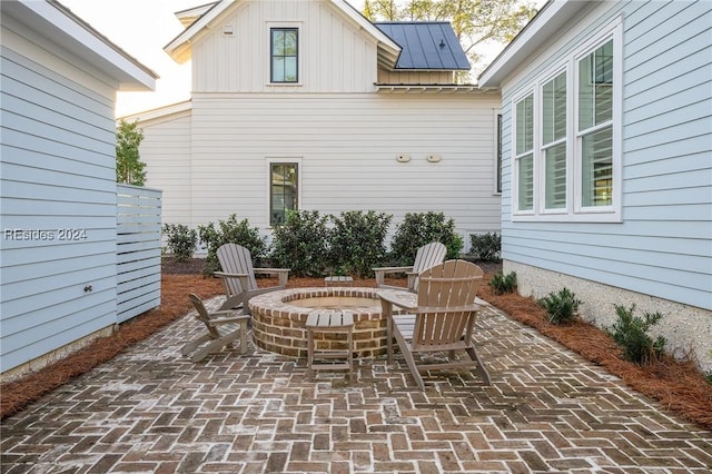 view of patio / terrace with a fire pit