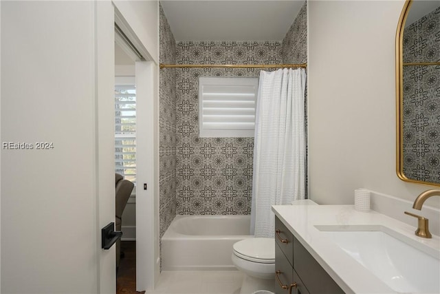 full bathroom with tile patterned floors, vanity, toilet, and shower / tub combo