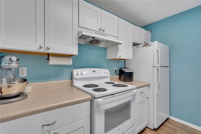 kitchen with white cabinetry, white electric range oven, and light wood-type flooring