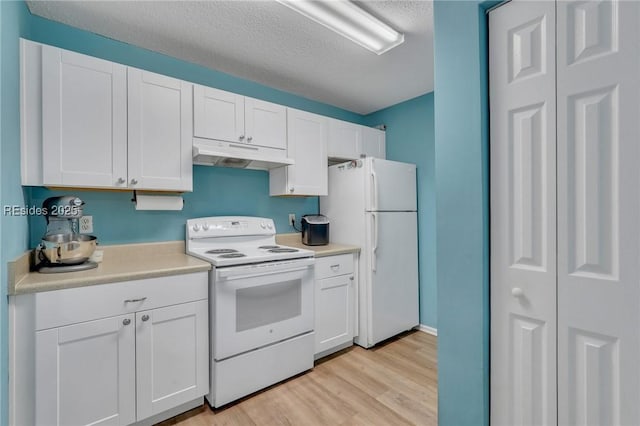 kitchen with white cabinetry, white appliances, a textured ceiling, and light hardwood / wood-style flooring