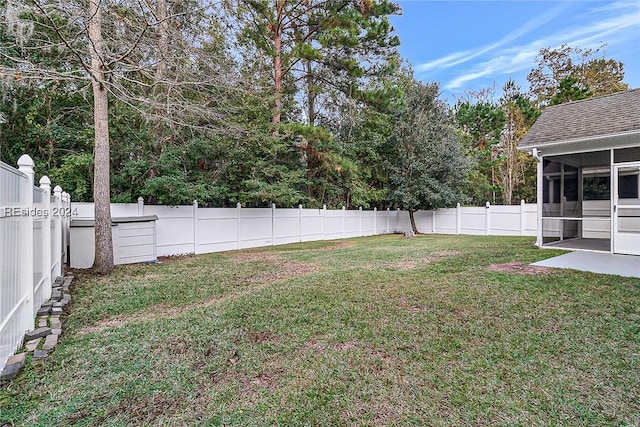 view of yard with a patio and a sunroom