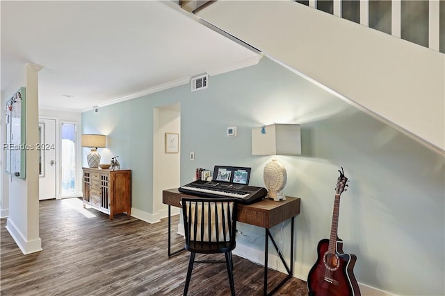 home office with crown molding and dark hardwood / wood-style flooring