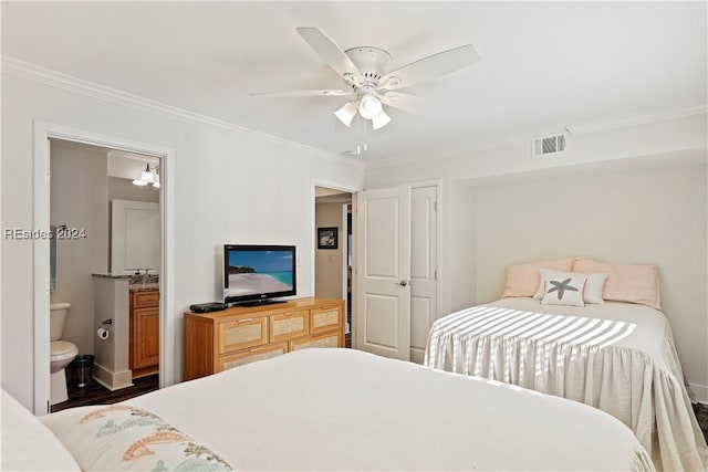 bedroom featuring dark wood-type flooring, connected bathroom, ornamental molding, a closet, and ceiling fan