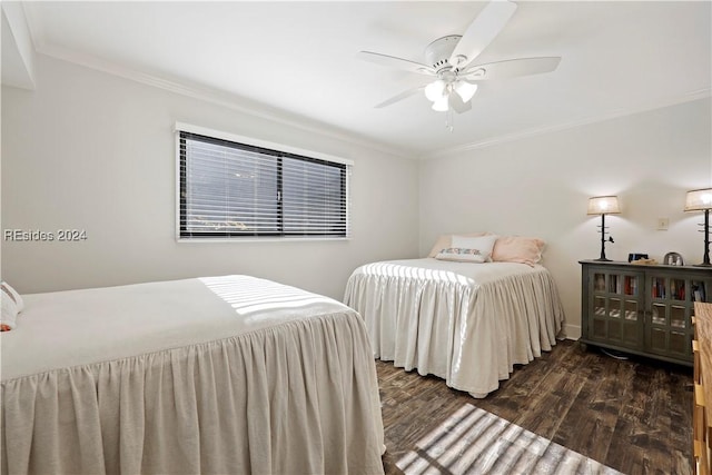 bedroom featuring crown molding, ceiling fan, and dark hardwood / wood-style floors