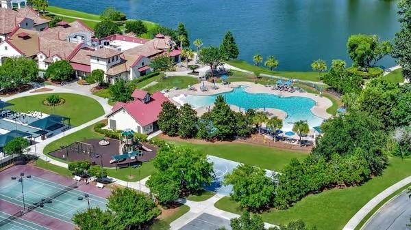 birds eye view of property with a water view