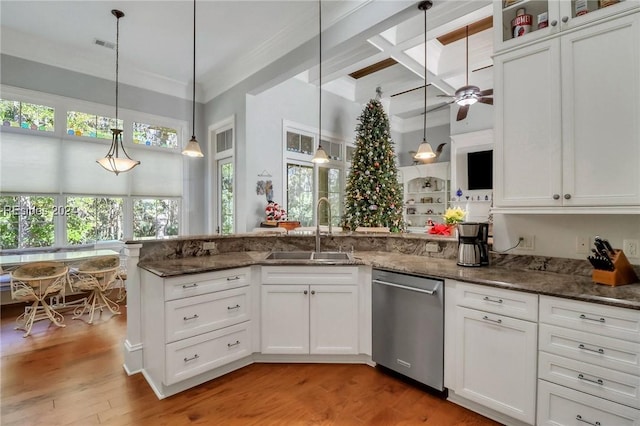 kitchen featuring pendant lighting, sink, coffered ceiling, and stainless steel dishwasher