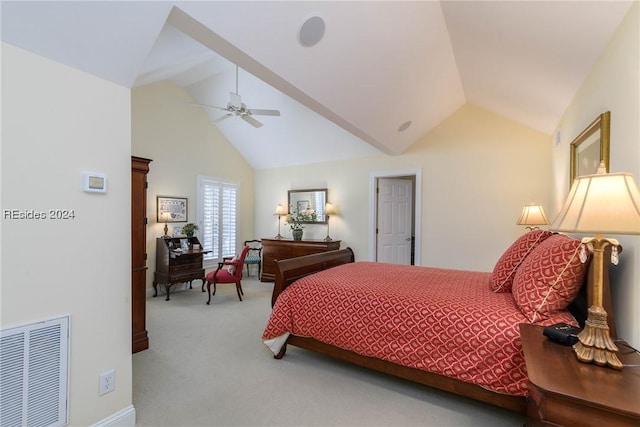 carpeted bedroom featuring ceiling fan and vaulted ceiling