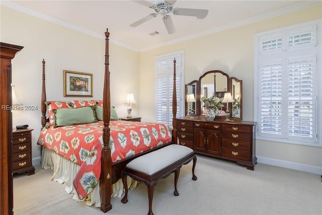 bedroom featuring crown molding, light carpet, and ceiling fan