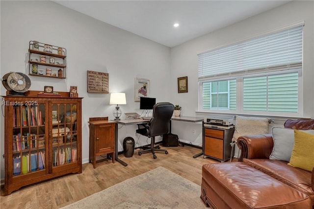 home office featuring light hardwood / wood-style flooring