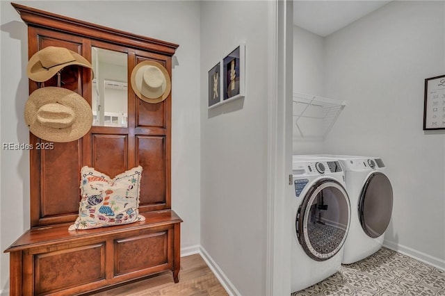 washroom featuring washer and dryer