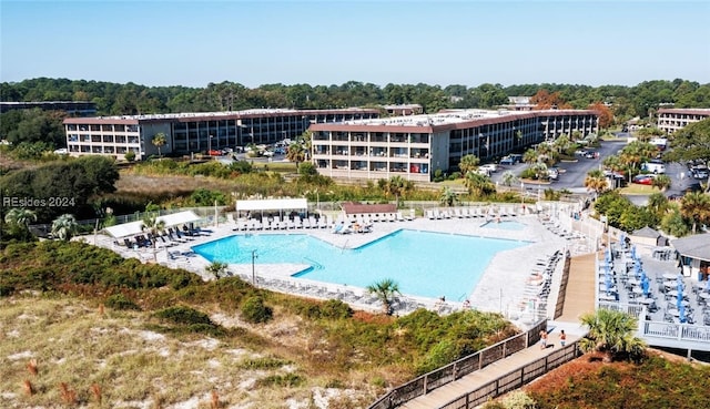 view of swimming pool with a patio