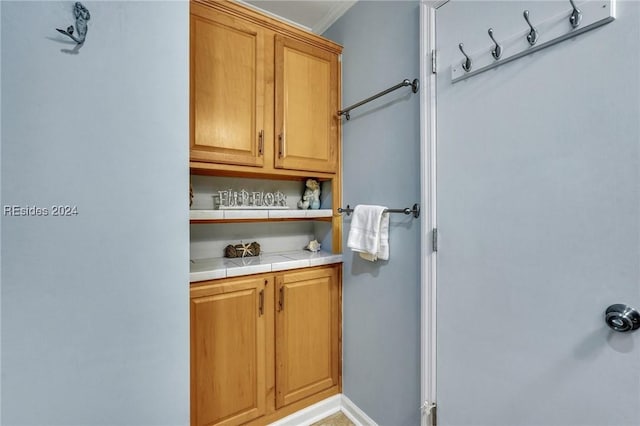 interior space featuring tile counters