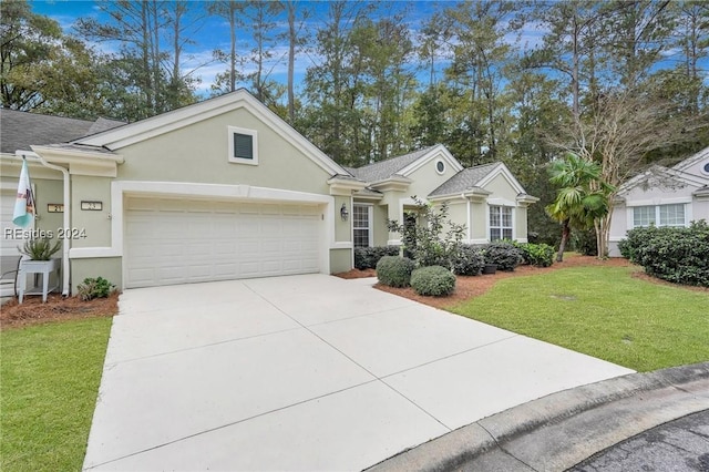 ranch-style home with a garage and a front lawn