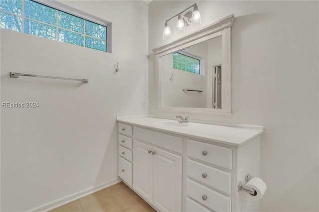 bathroom with vanity and tile patterned flooring