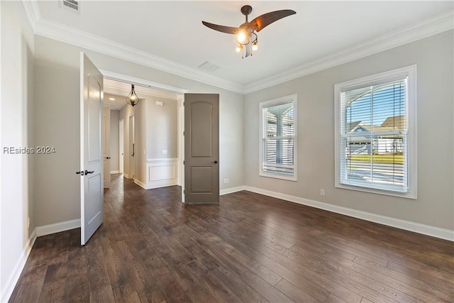 unfurnished bedroom featuring crown molding, ceiling fan, and dark hardwood / wood-style floors