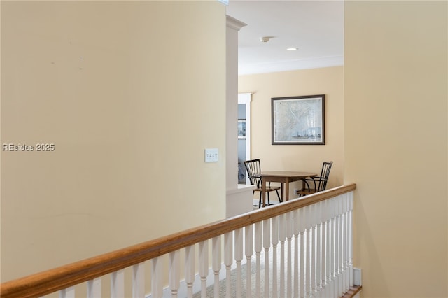 hallway with crown molding