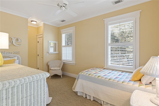 carpeted bedroom featuring multiple windows, crown molding, and ceiling fan