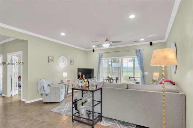 tiled living room with crown molding and ceiling fan