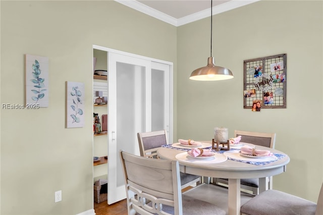 dining room with crown molding