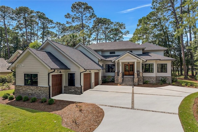 craftsman-style home featuring a garage