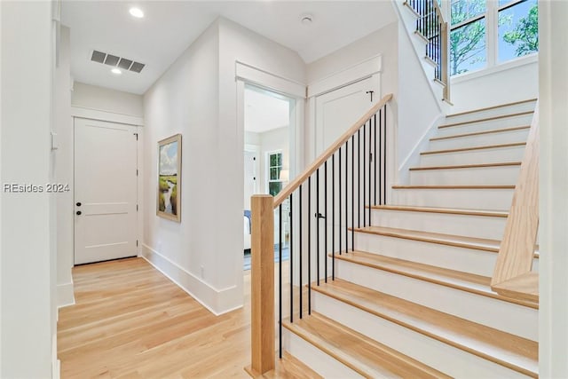 entrance foyer featuring light hardwood / wood-style flooring