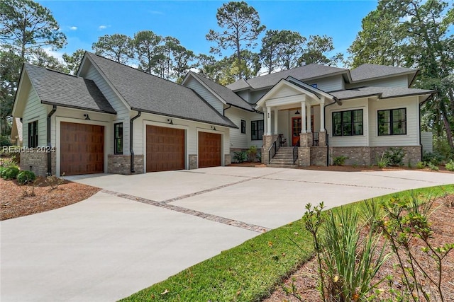 craftsman house featuring a garage