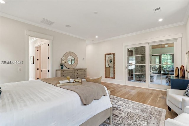 bedroom featuring crown molding and hardwood / wood-style floors