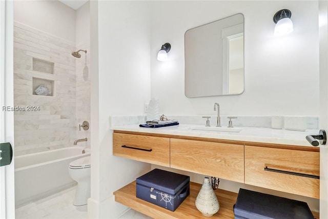 full bathroom featuring vanity, tiled shower / bath combo, and toilet