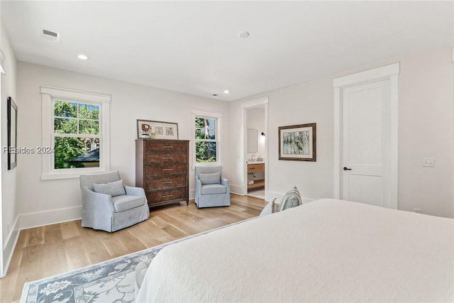 bedroom with light wood-type flooring