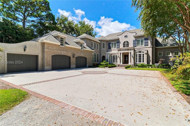 view of front of home with a garage