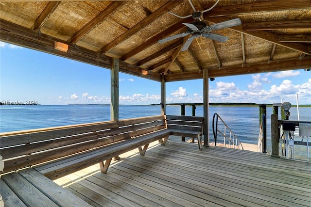 view of dock featuring a gazebo and a water view