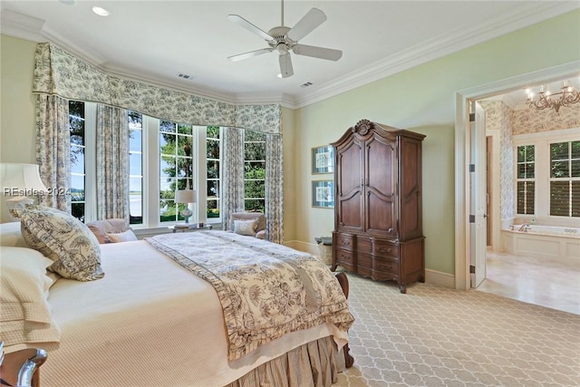 carpeted bedroom featuring ornamental molding, ceiling fan with notable chandelier, and ensuite bath