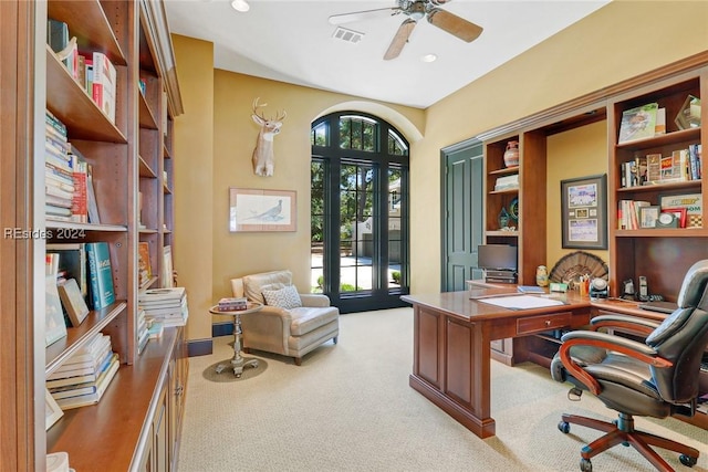 home office with light colored carpet and ceiling fan