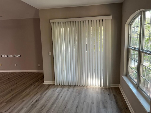 spare room with light wood-type flooring