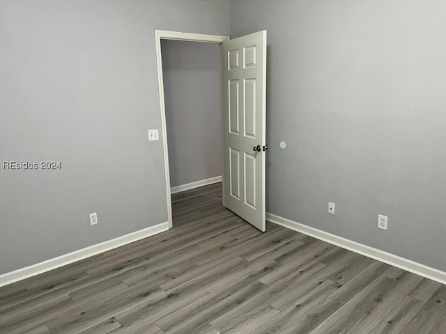 spare room featuring light hardwood / wood-style floors