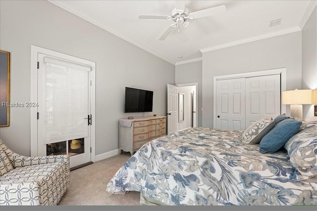 bedroom featuring crown molding, light colored carpet, ceiling fan, and a closet