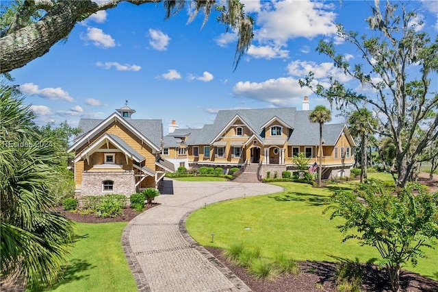 view of front of home with a front yard